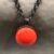 bronze/ red glass stone